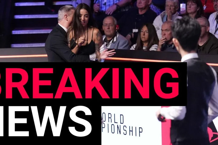 World Snooker Championship final halted by protestor complaining about BBC licence fee