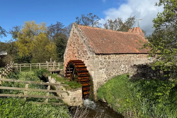 Mill which featured in Outlander grinds grain again