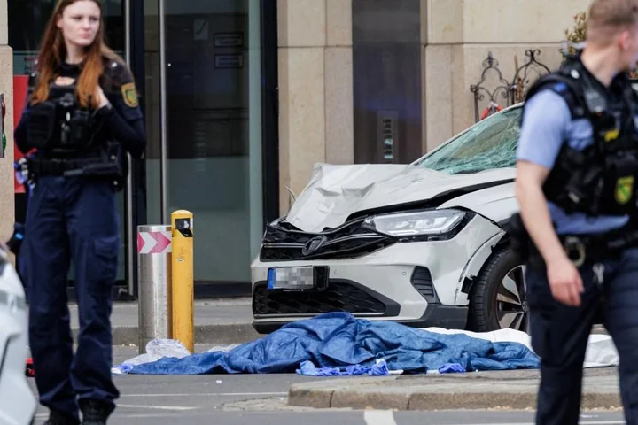 Two dead and at least 20 injured after car ploughs into crowd in German city