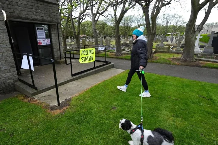 You can vote and visit grave of a sport legend at UK’s creepiest polling station