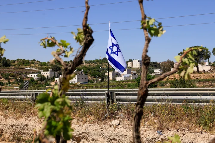 Israeli settlers force Palestinian family to exhume and rebury their father