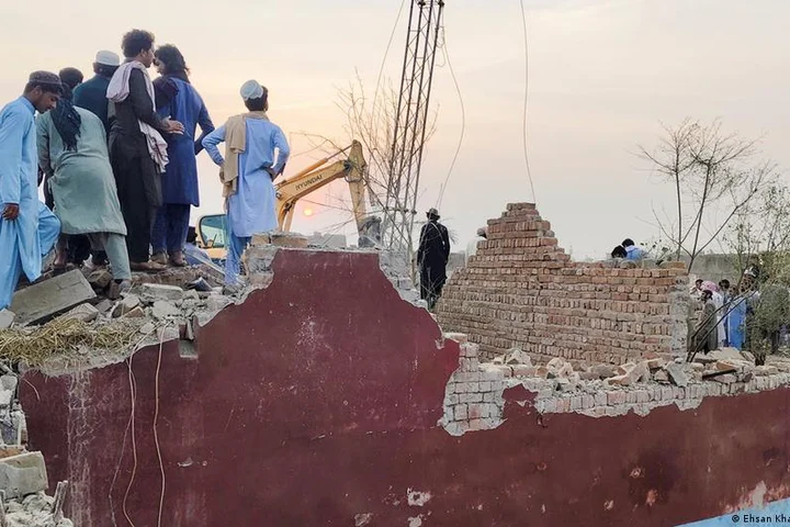 Car bomb attack at checkpoint kills 12