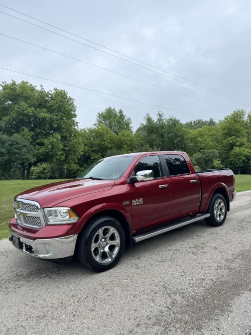  2014 Ram 1500 Laramie 4WD Crew Cab 5.7 8cyl. Gasoline