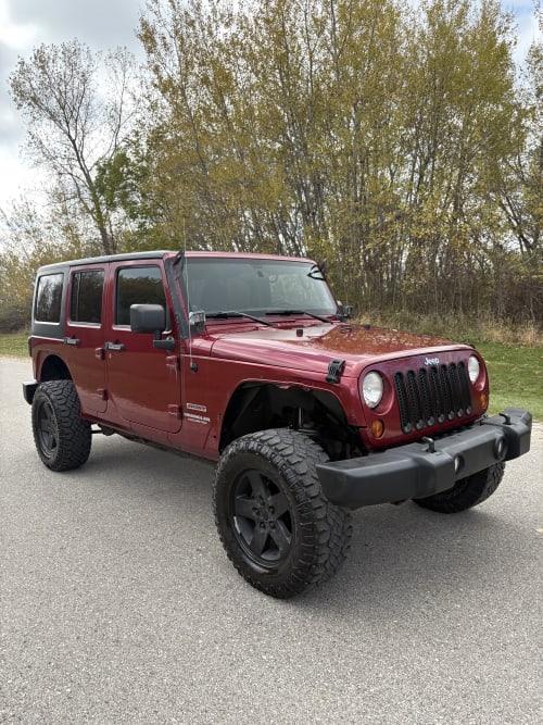 2011 Jeep Wrangler Unlimited Sport 4WD 4D SUV 3.8 6cyl. Gasoline