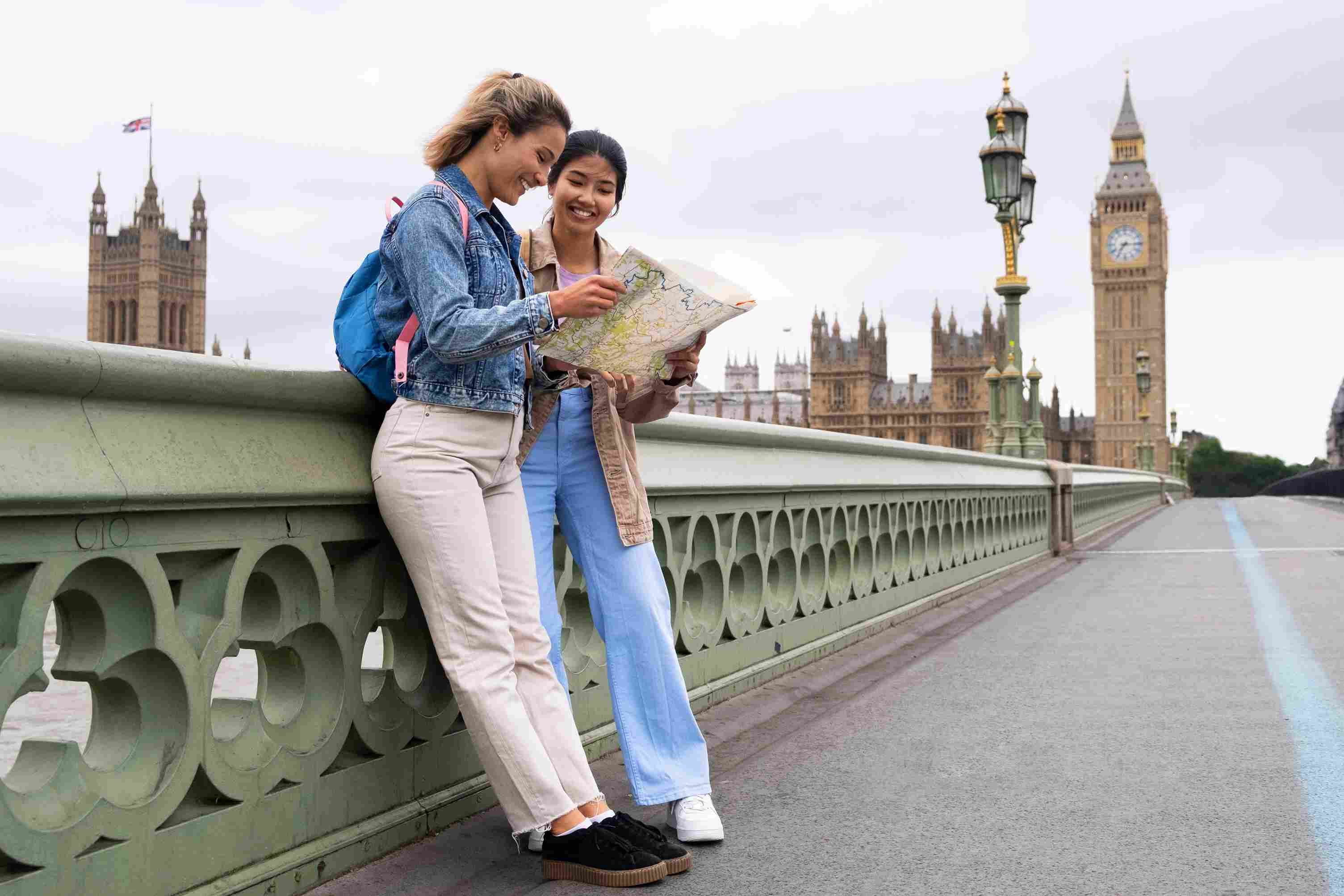 Two girls standing on London bridge