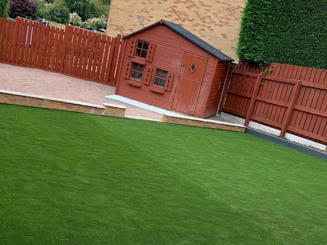 New artificial lawn with wendy house