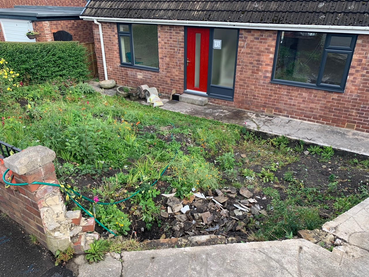 Bungalow with overgrown garden