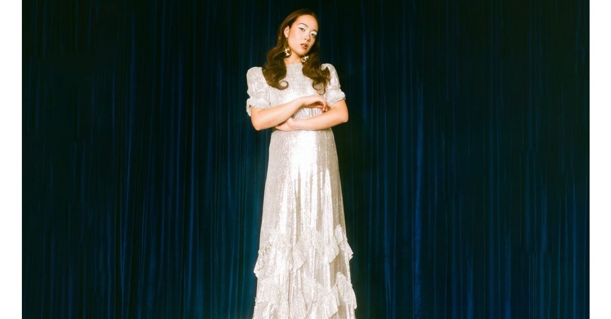 Laufey performing on stage