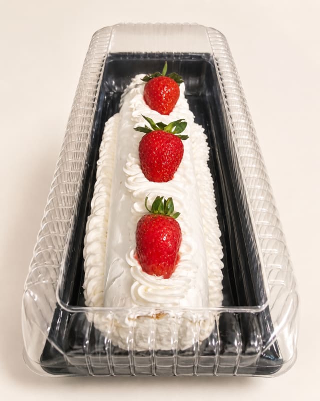 Pastel de fresas (Niño envuelto) — imagen 1 de 1