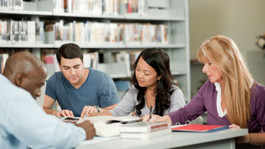 Image of a group of people studying for Spanish developed