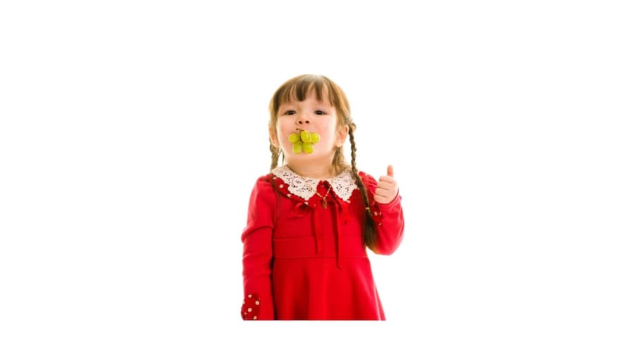 Kid with grapes