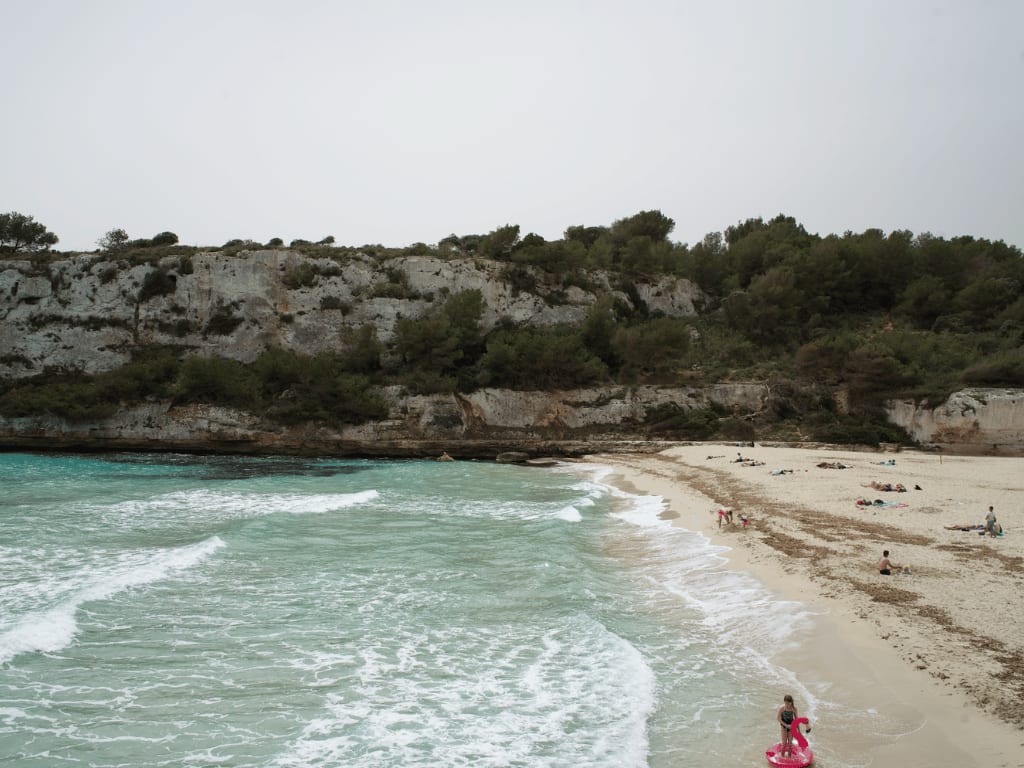 Cala Estany den Mas cloudy beach weather in mallorca