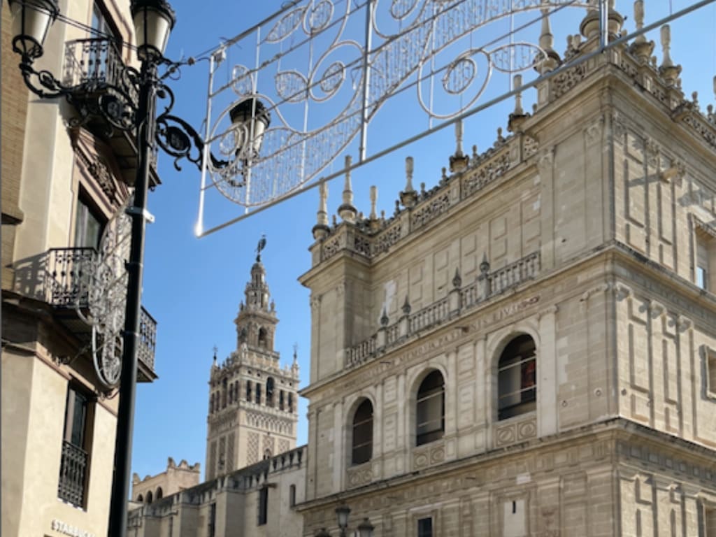 Picture of the christmas lights in front of the Cathedral of Seville.