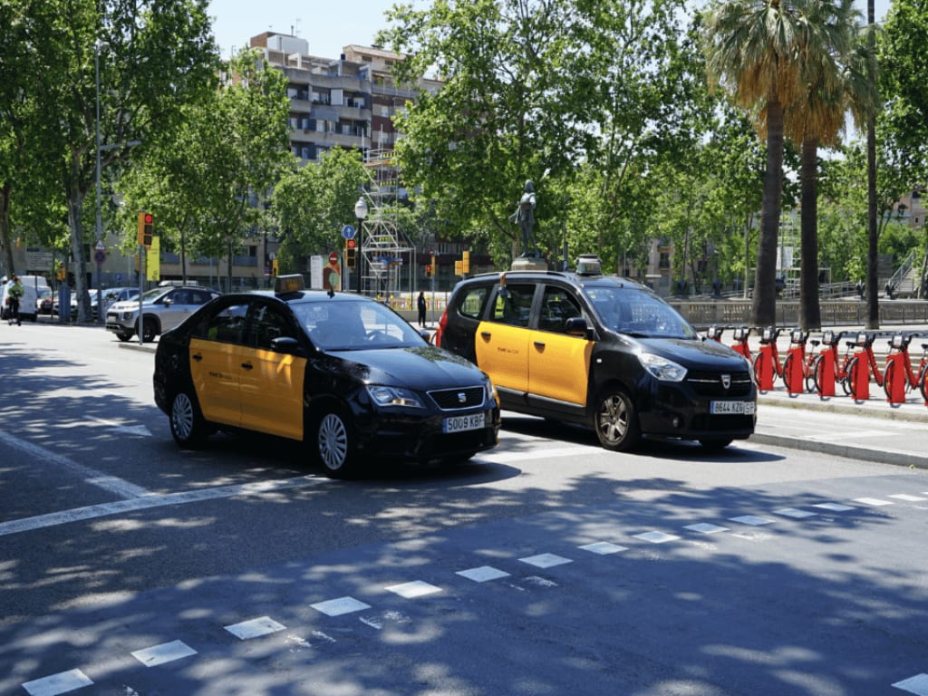 Black and yellow taxis in Barcelona.