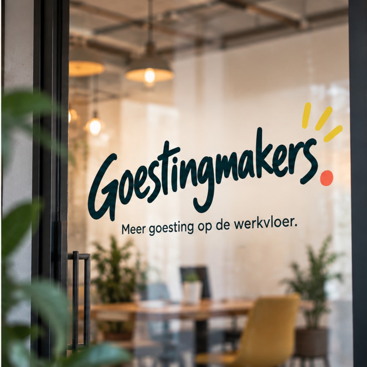 Goestingmakers-logo op een glazen deur: Meer goesting op de werkvloer.