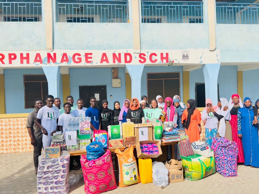 Children receiving educational materials