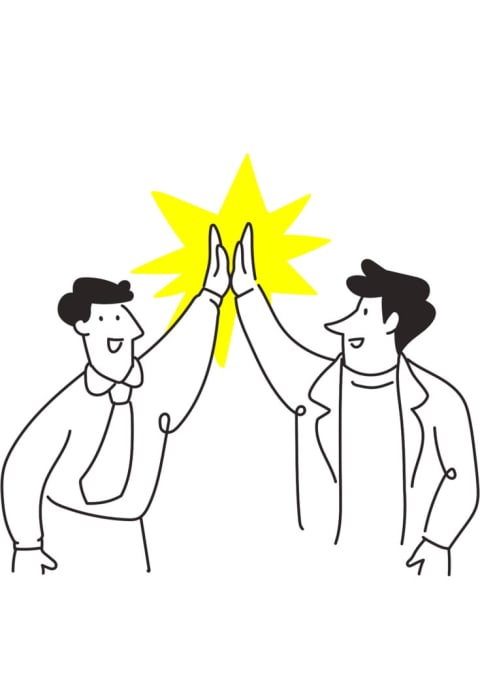 Two students celebrating with a high five