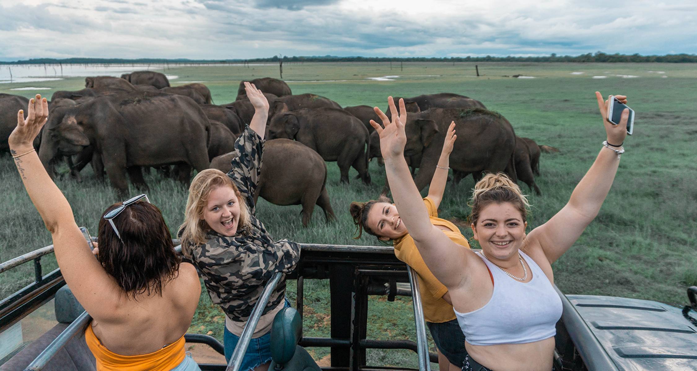 Travelers experiencing the scenic hill country train journey