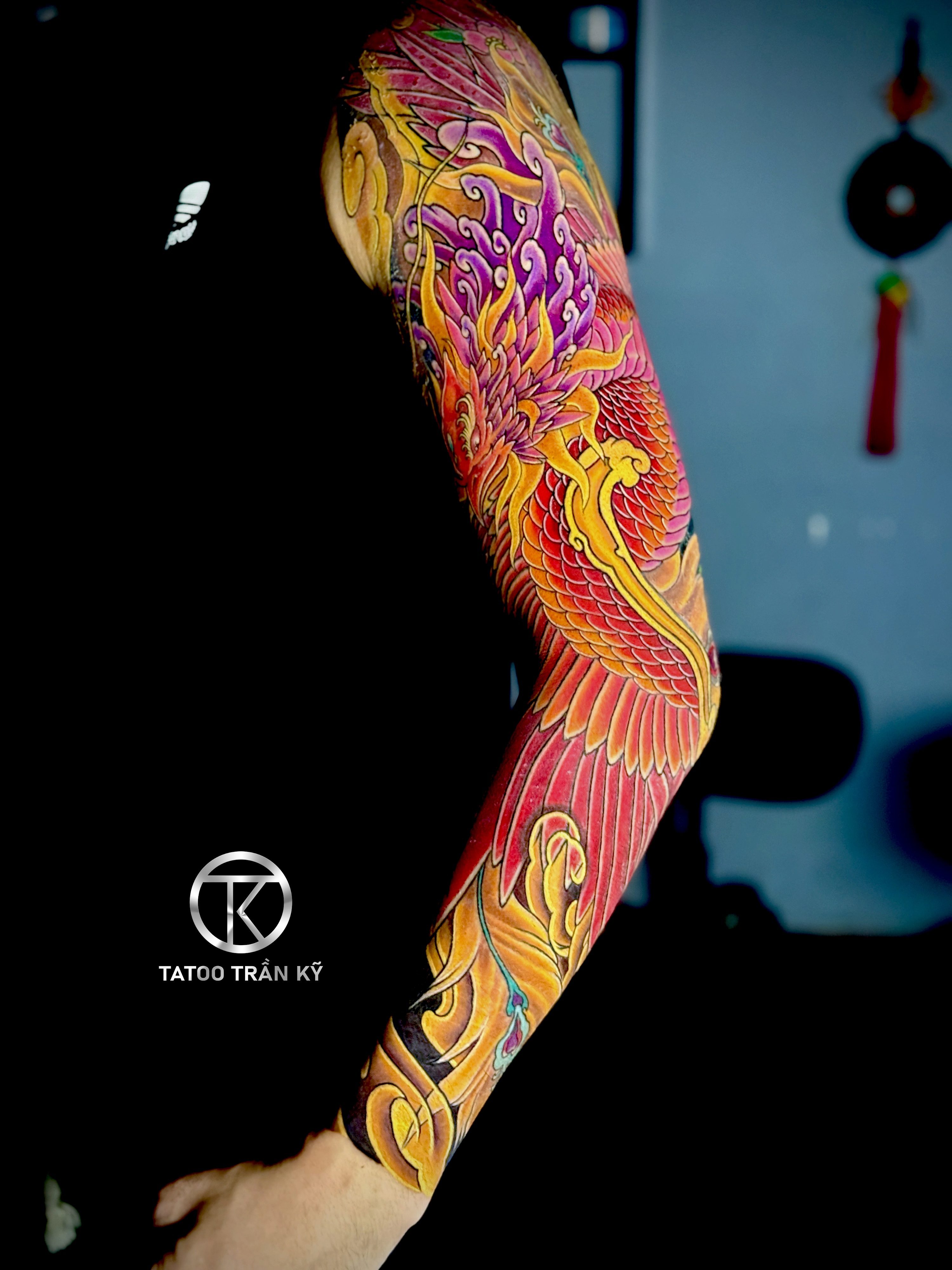 Full sleeve Phoenix tattoo work directly performed by Tran Ky Tattoo