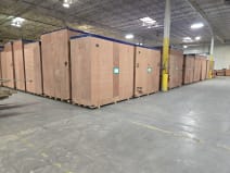 2 VIEW OF NEW EQUIPMENT IN CRATES