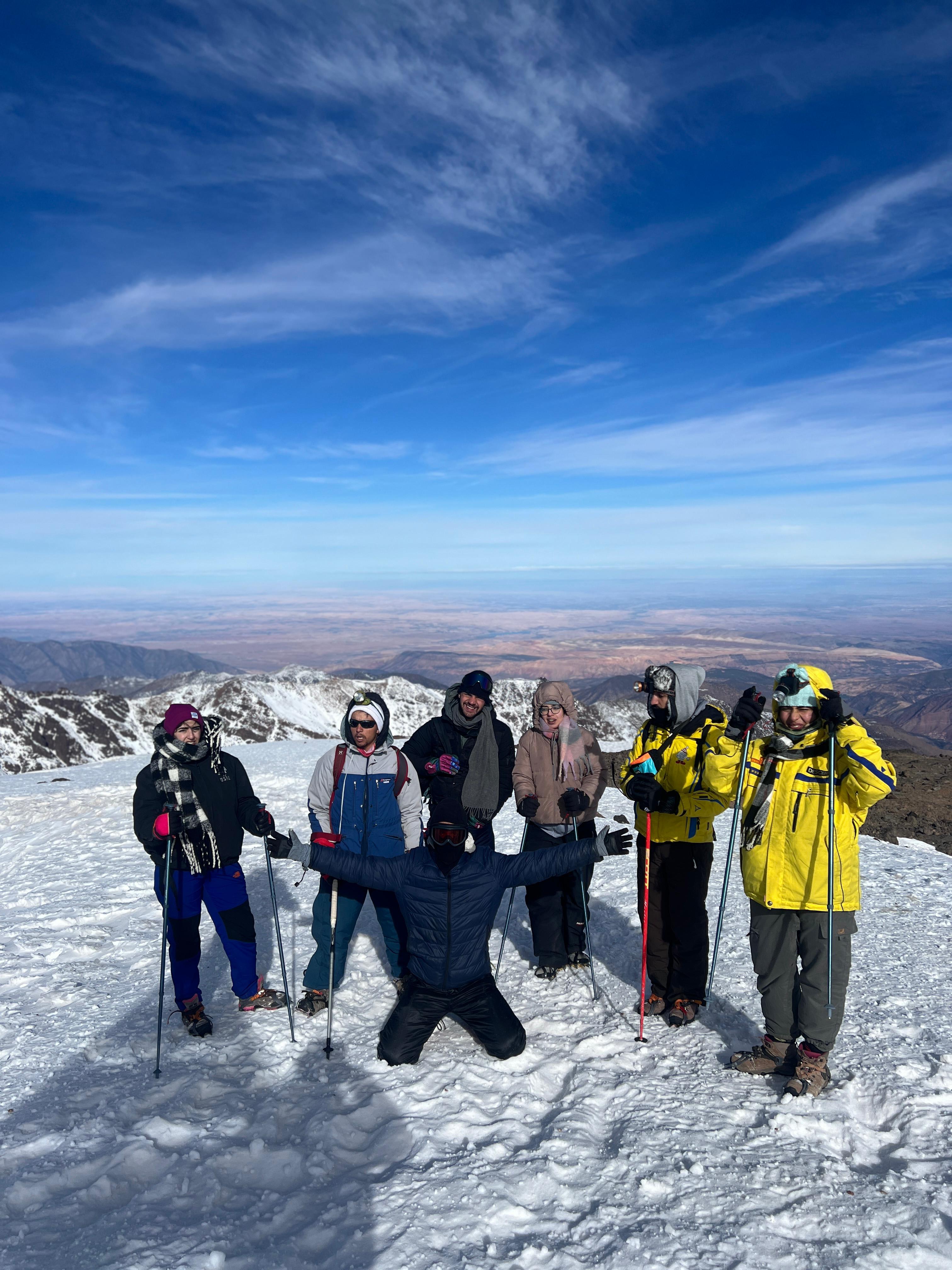 Youssef with a client in front of Toubkal Refuge Les Mouflons before climbing Mount Toubkal