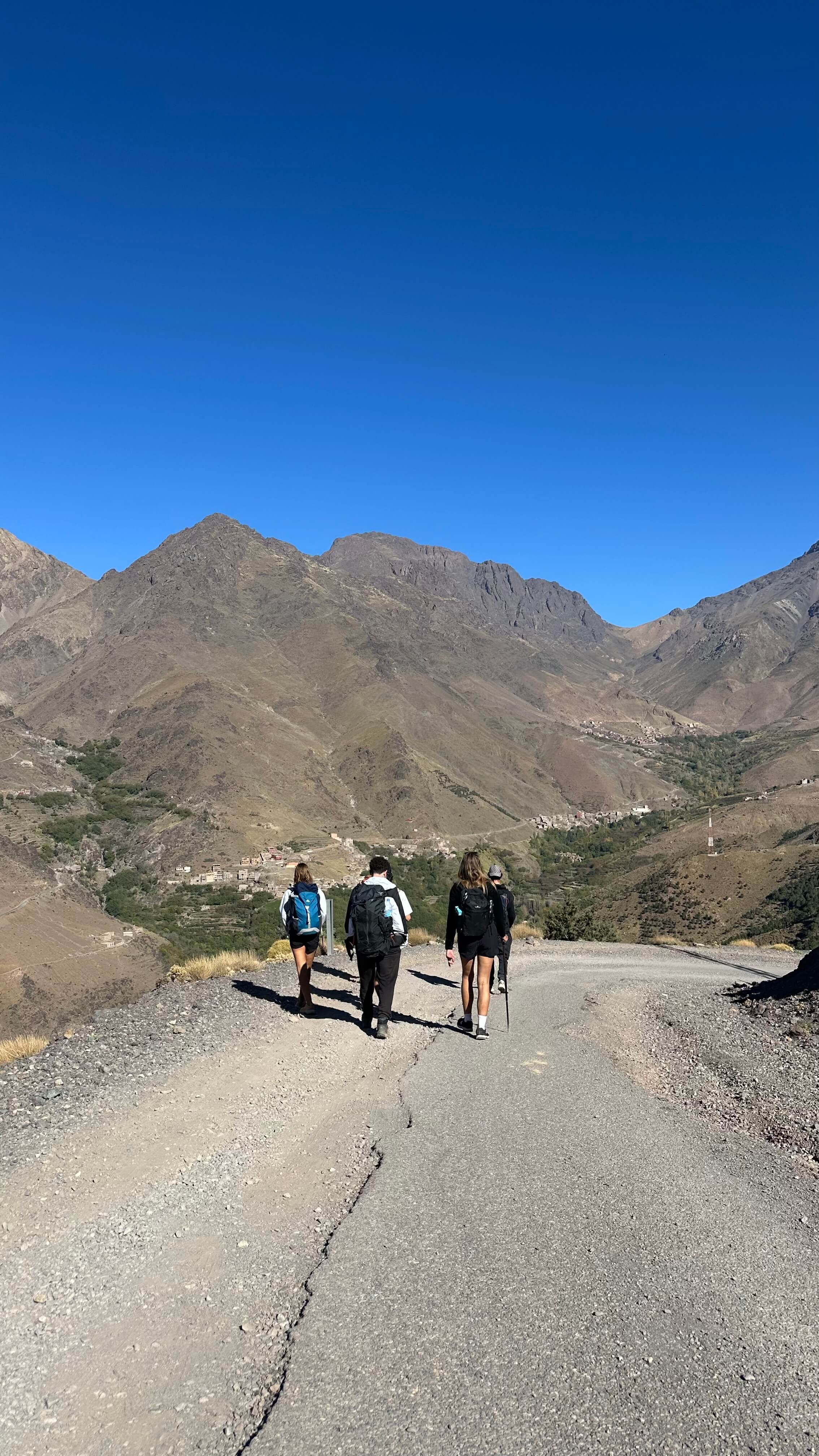 Berber valleys trekking route near Imlil with villages and terraced mountain scenery