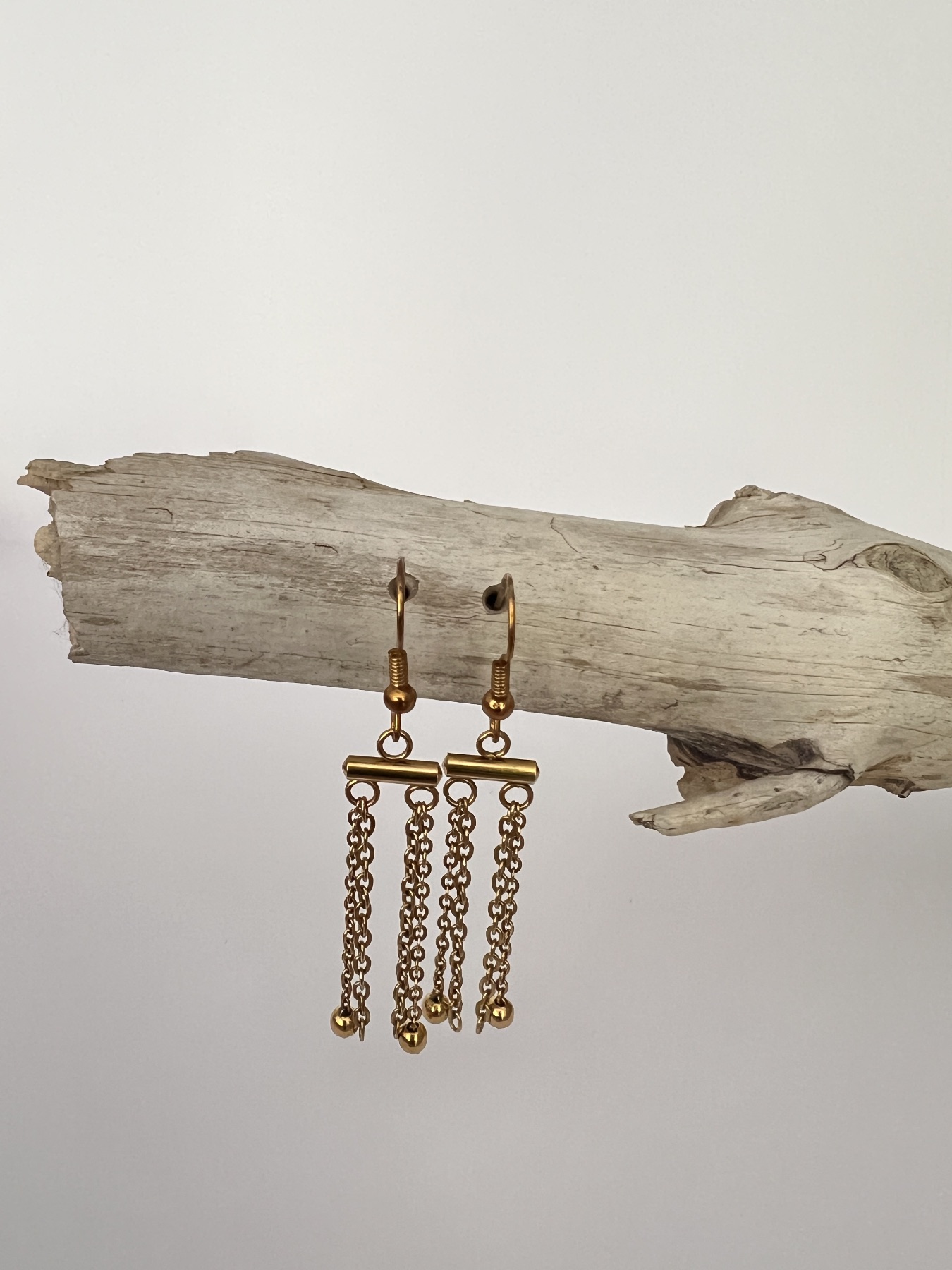 Boucles d'oreilles dorées à chainettes