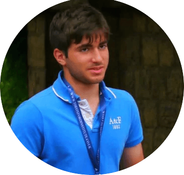 Spanish student (16–18 years old) smiles while sharing their Oxford Summer Program experience at Somerville College, enjoying international friendships and a vibrant, multicultural environment.  Caption: