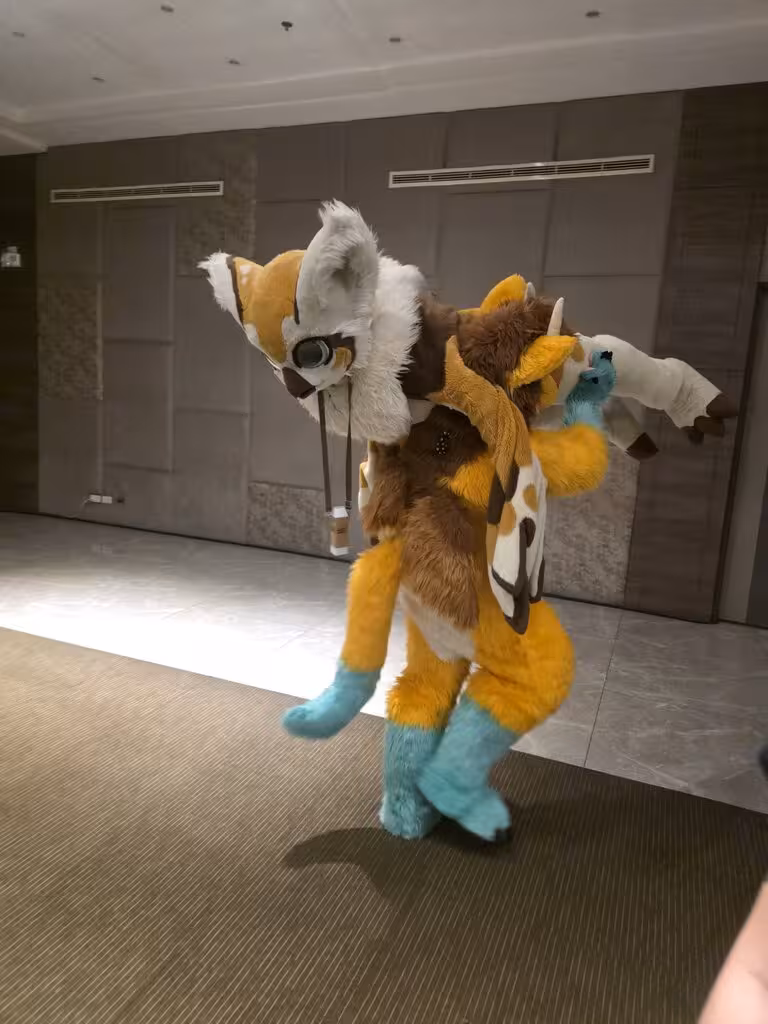 Artwork by Fursuiter: Sinaga & MayChaba | Photographer: HeySmilou