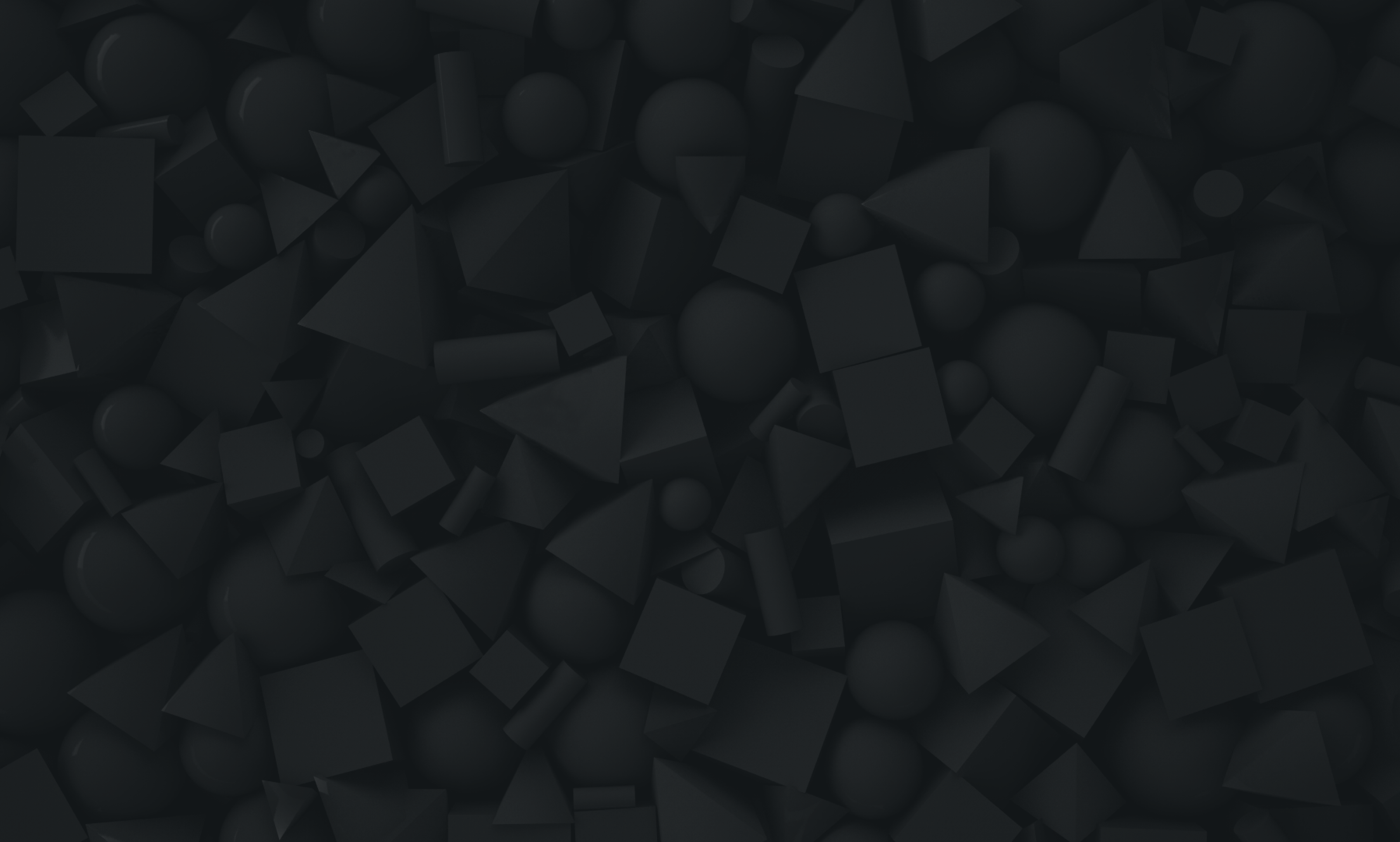 small scattered charcoal 3d shapes on a black background