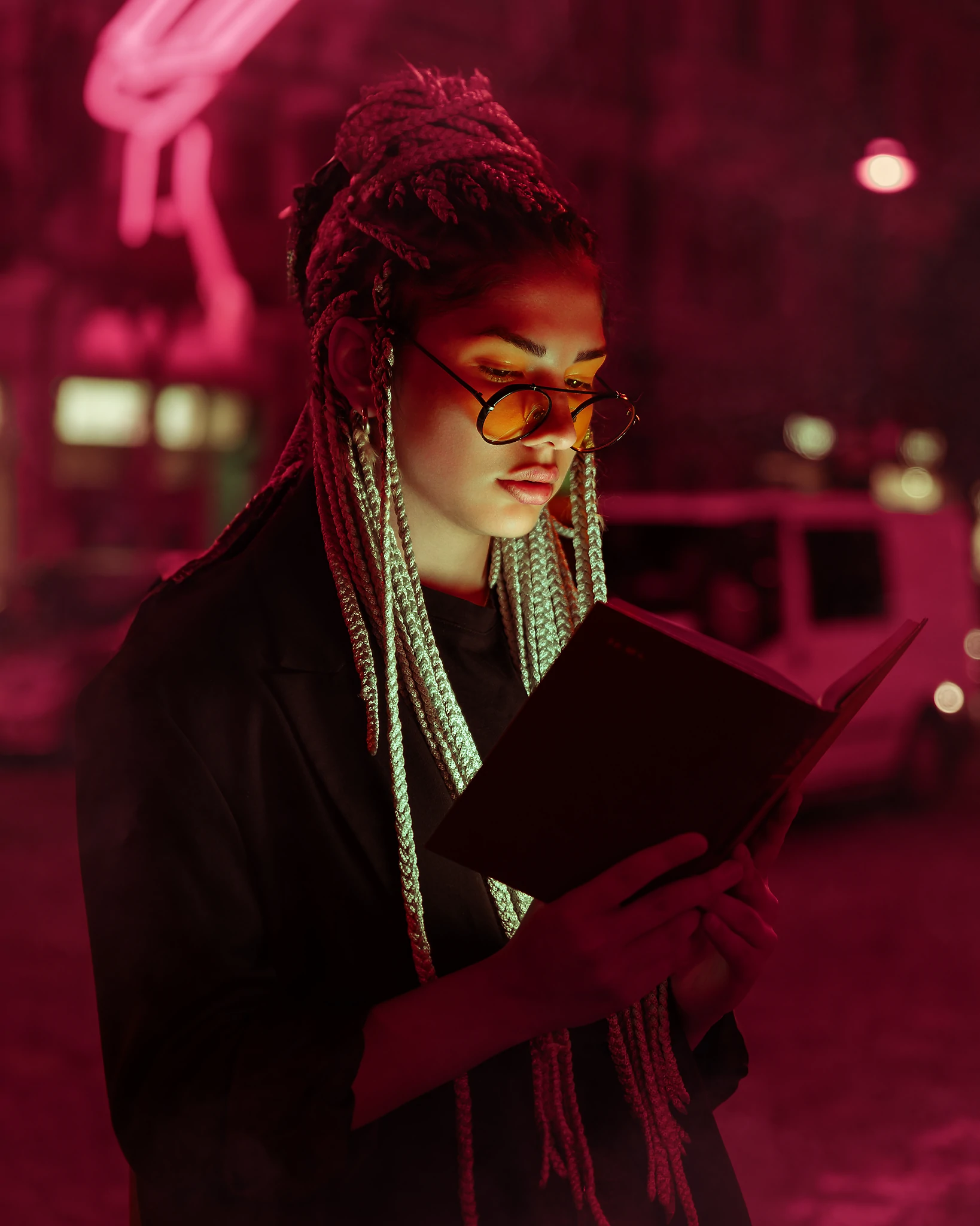 A portrait with creative neon light effects and retouching.