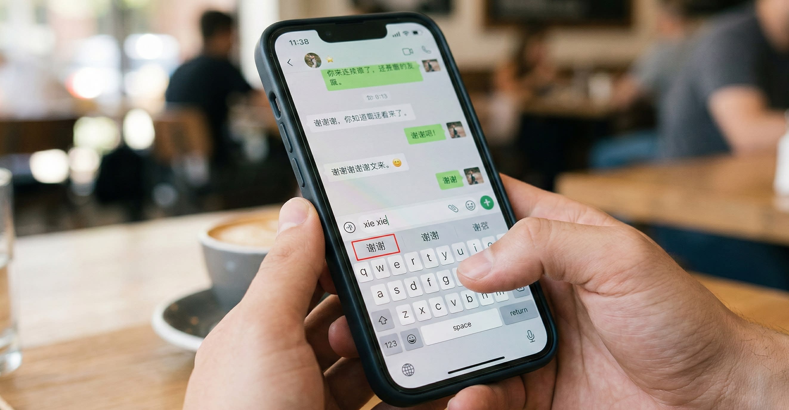 A close-up of a smartphone screen showing someone typing Pinyin and the Chinese character suggestions popping up