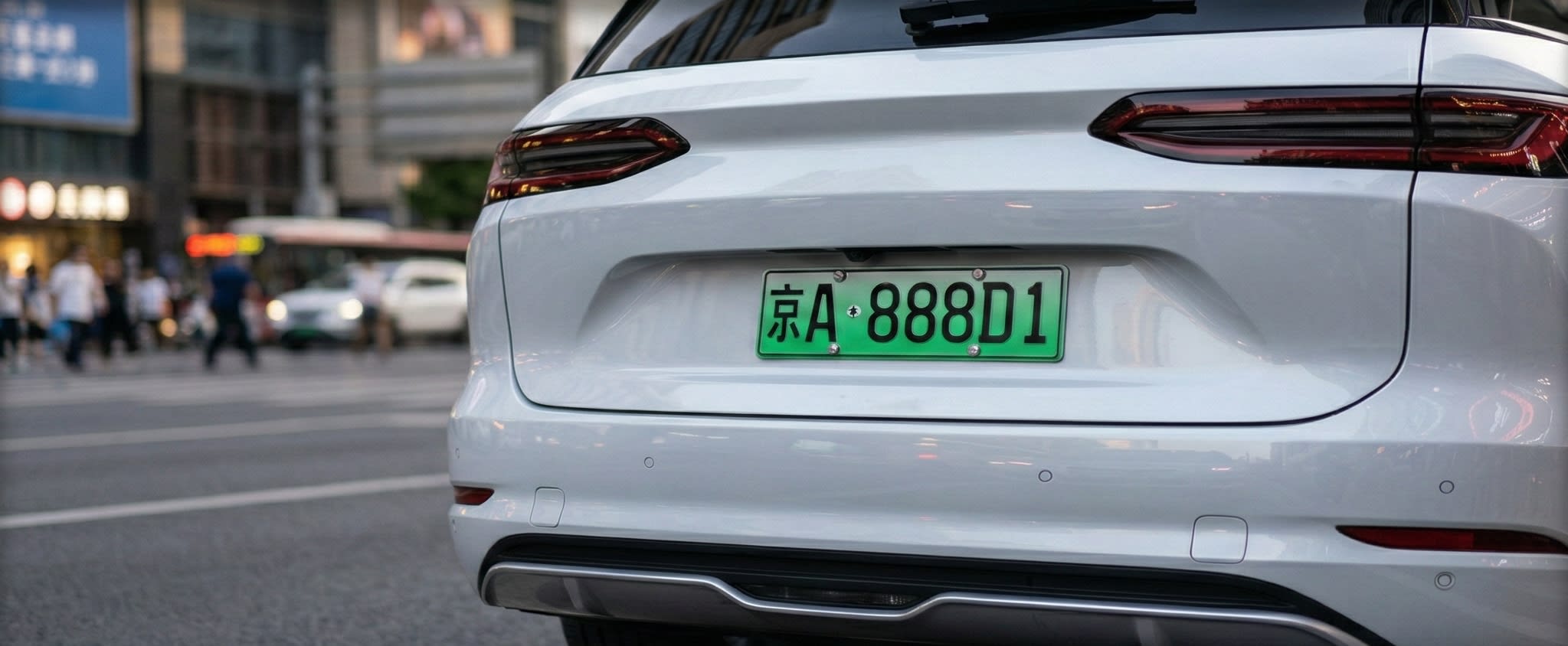 A sleek modern electric SUV showing a highly coveted green license plate ending in 888