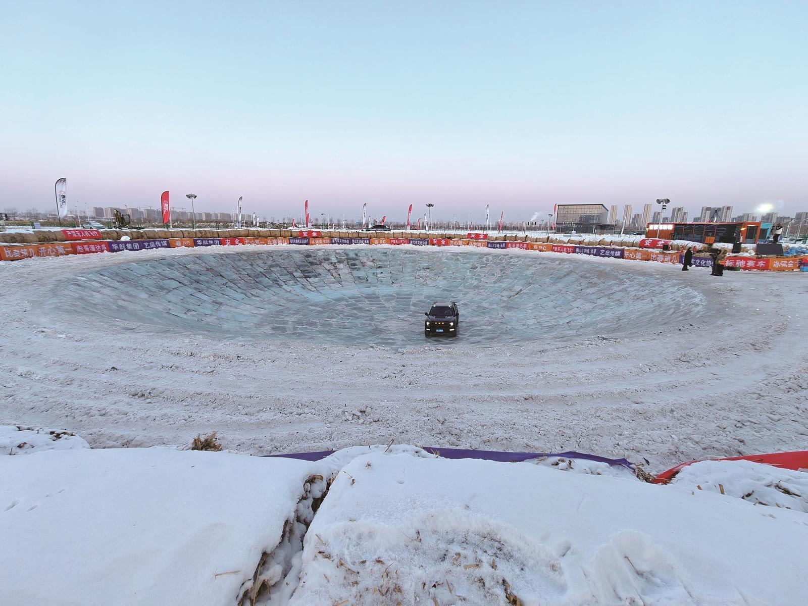 Aerial view of the 48-meter diameter ice bowl structure in Changchun West Lake Park