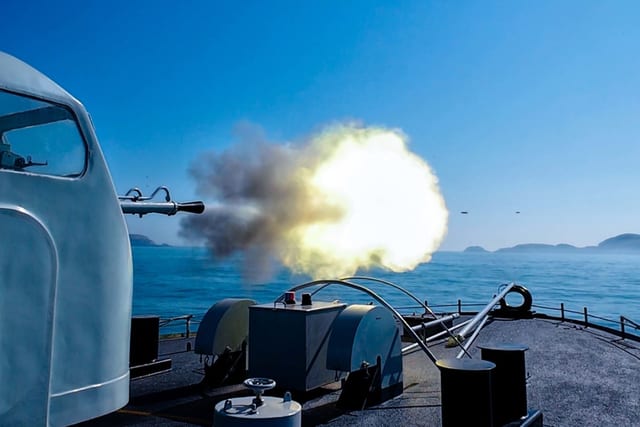 Main naval gun firing during live-fire exercise