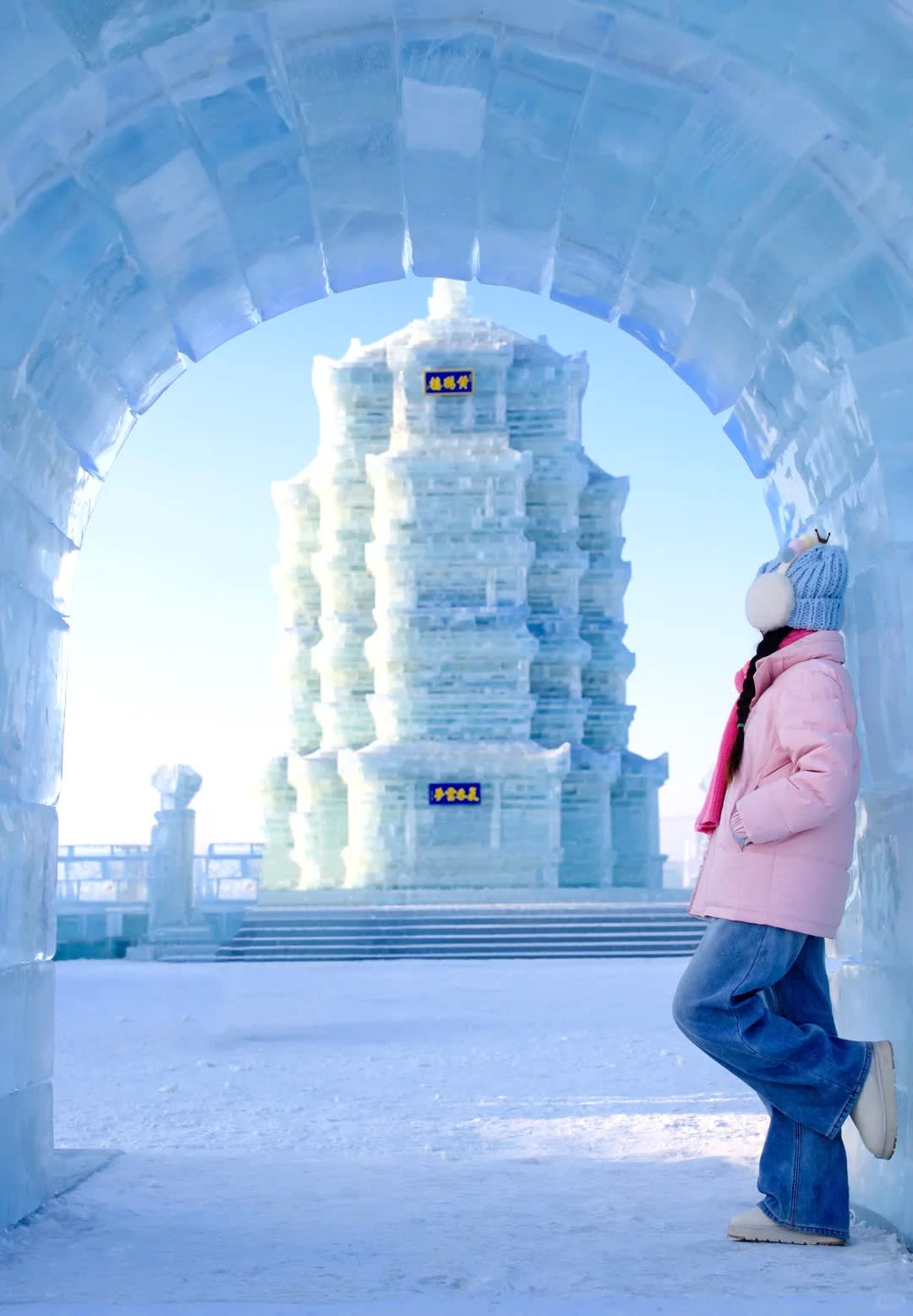 Tourist in Bright Pink Coat at Ice Castle