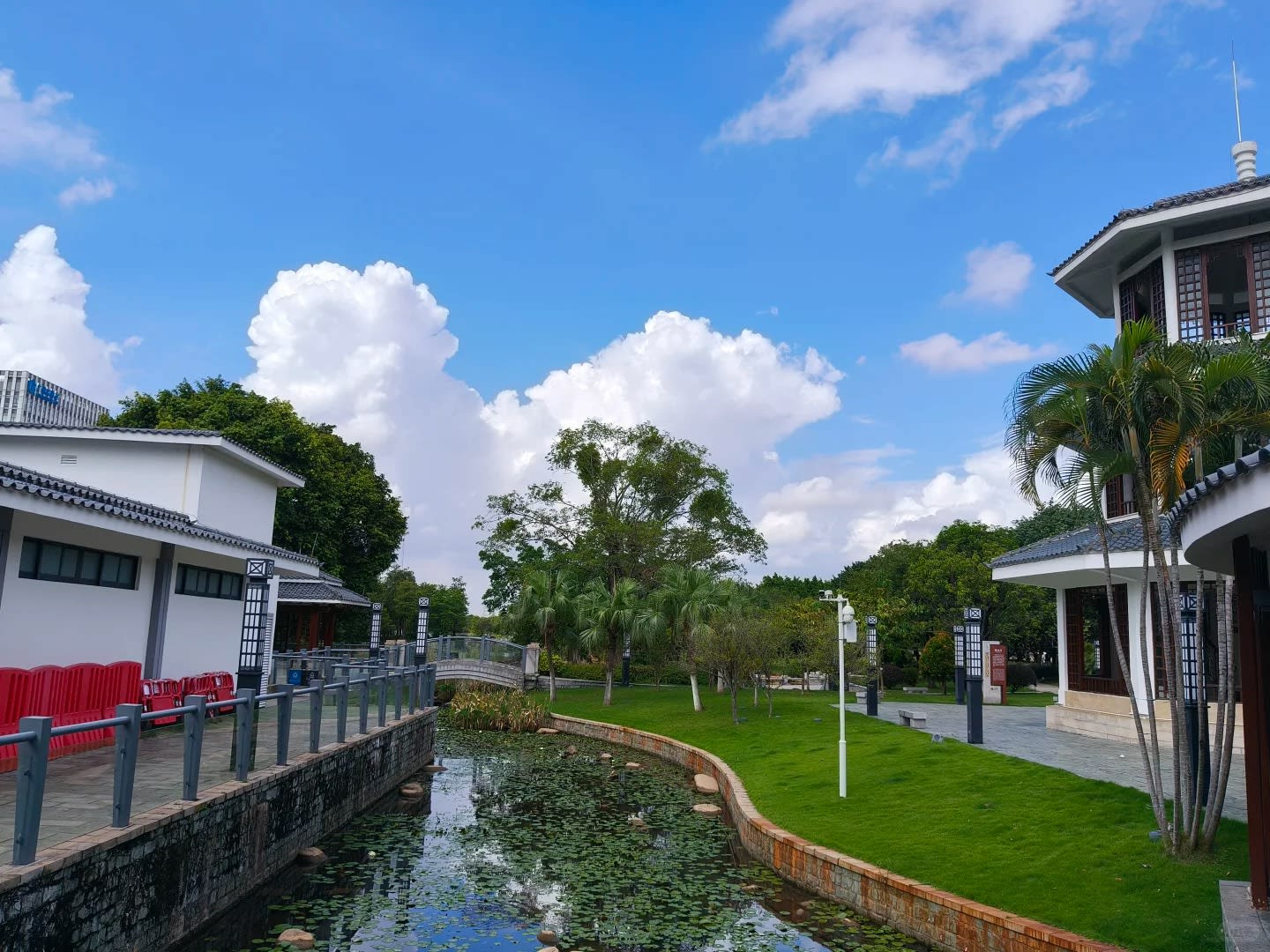 Traditional Lingnan-style pavilion and zigzag bridge at Shui Moyuan Garden