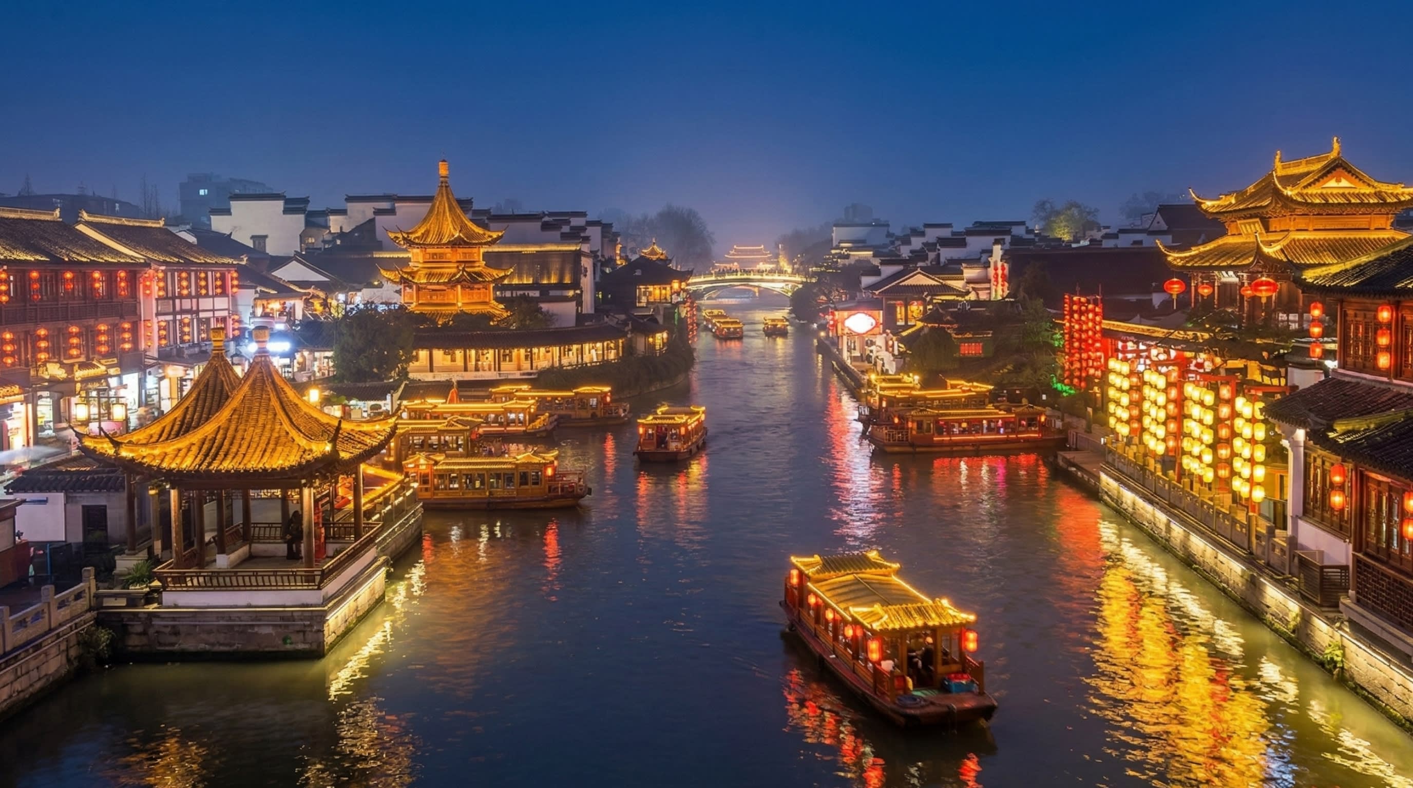 A romantic night view of traditional wooden canopy boats sailing on the Qinhuai River, surrounded by glowing pavilions
