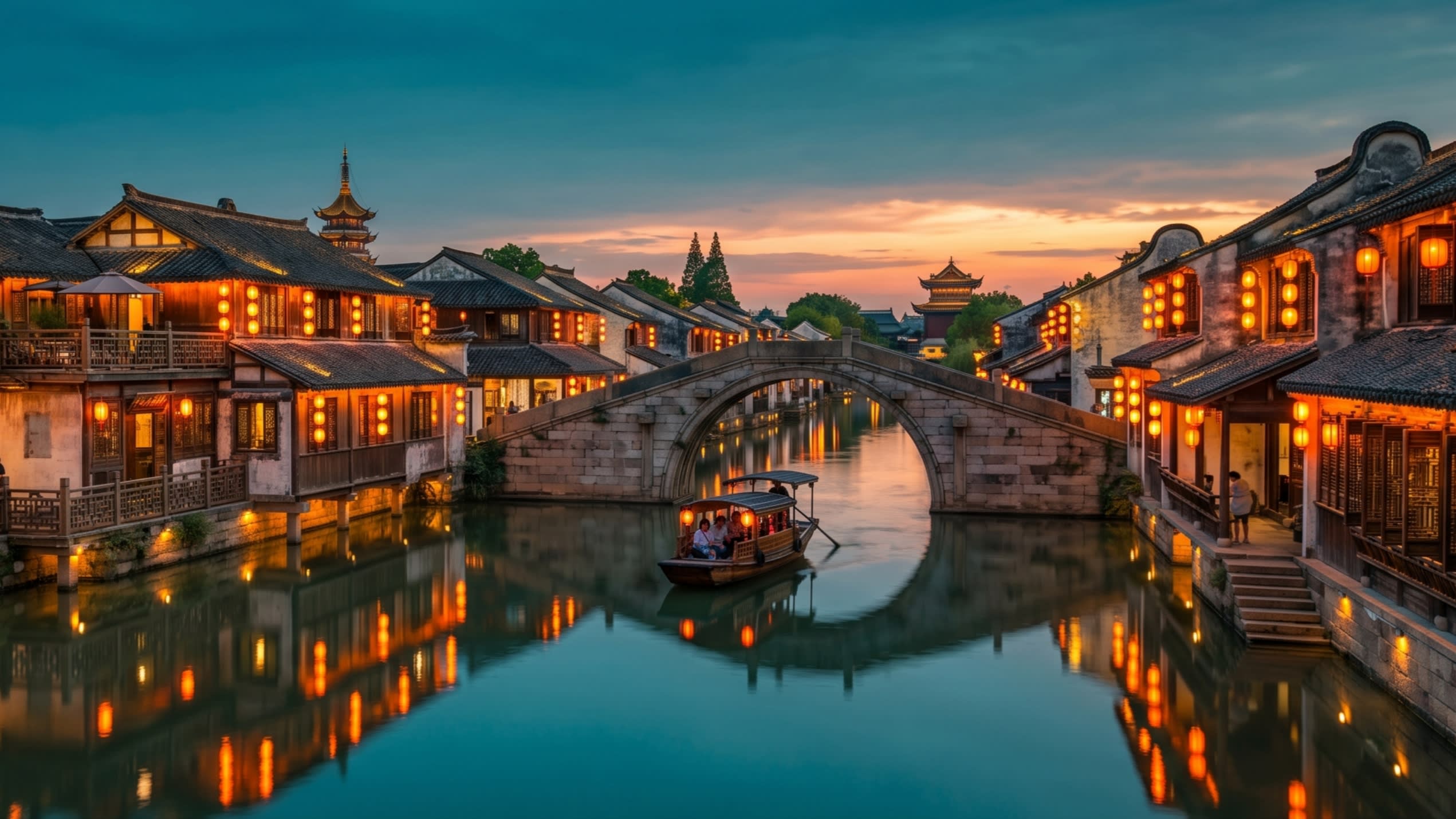 Hero Image - A breathtaking sunset view of Wuzhen West Scenic Zone with glowing lanterns