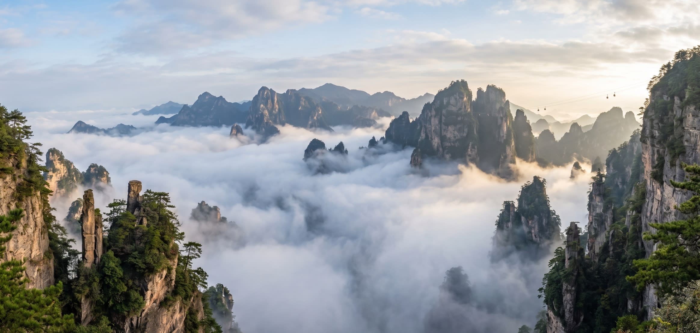 A breathtaking, serene view of mountains shrouded in morning mist