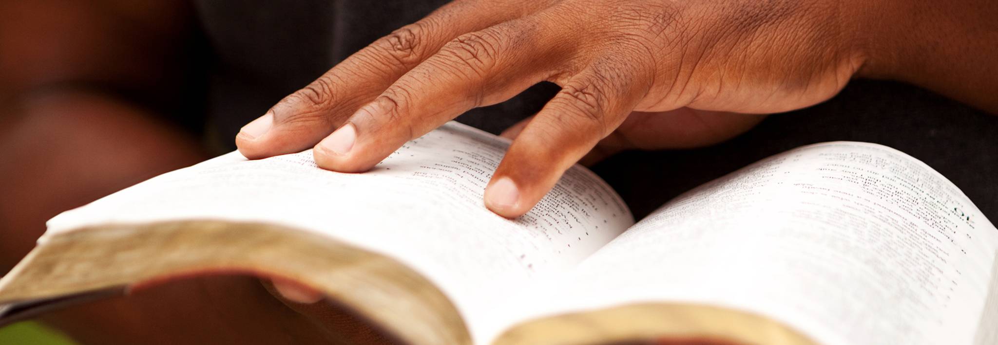 A person studying the Bible.
