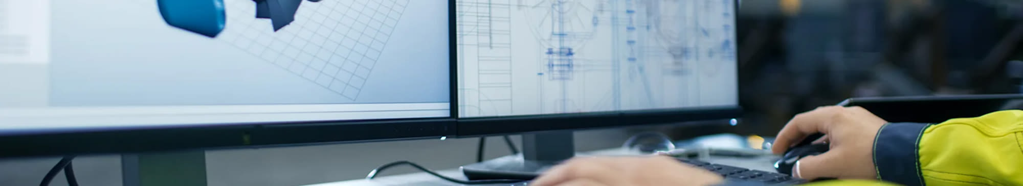 engineer working at a desk and computer