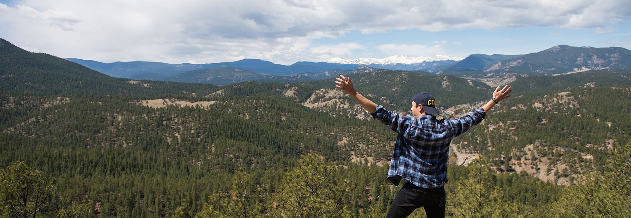 Man in Colorado mountains A CCU student in the mountains of Colorado.