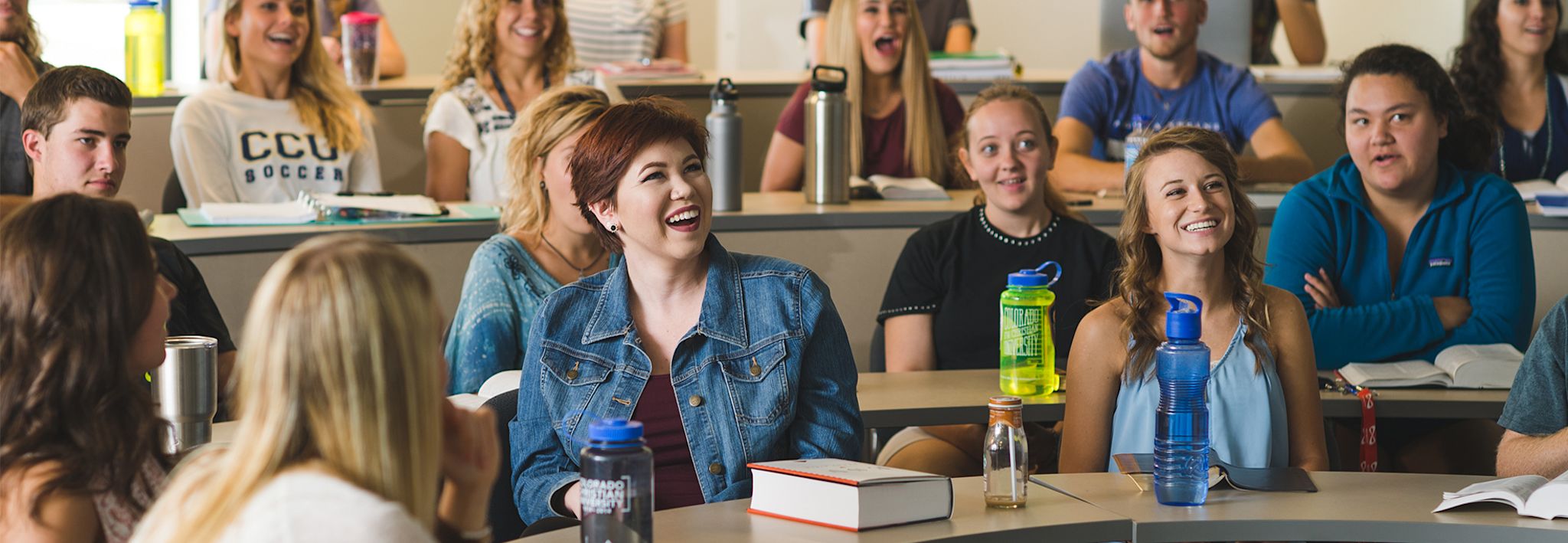 A group of students chatting during a class at CCU.