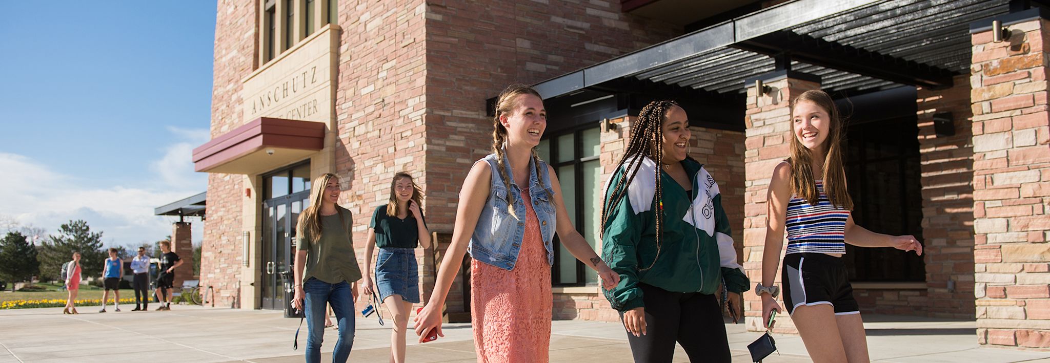 A group of students walking around the CCU campus.