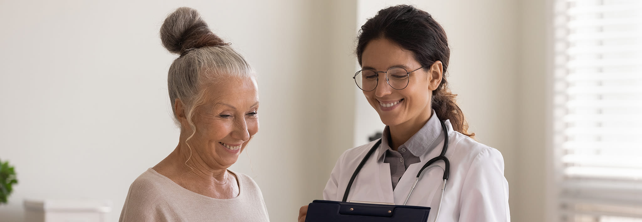 dnp student smiling in their nursing uniform