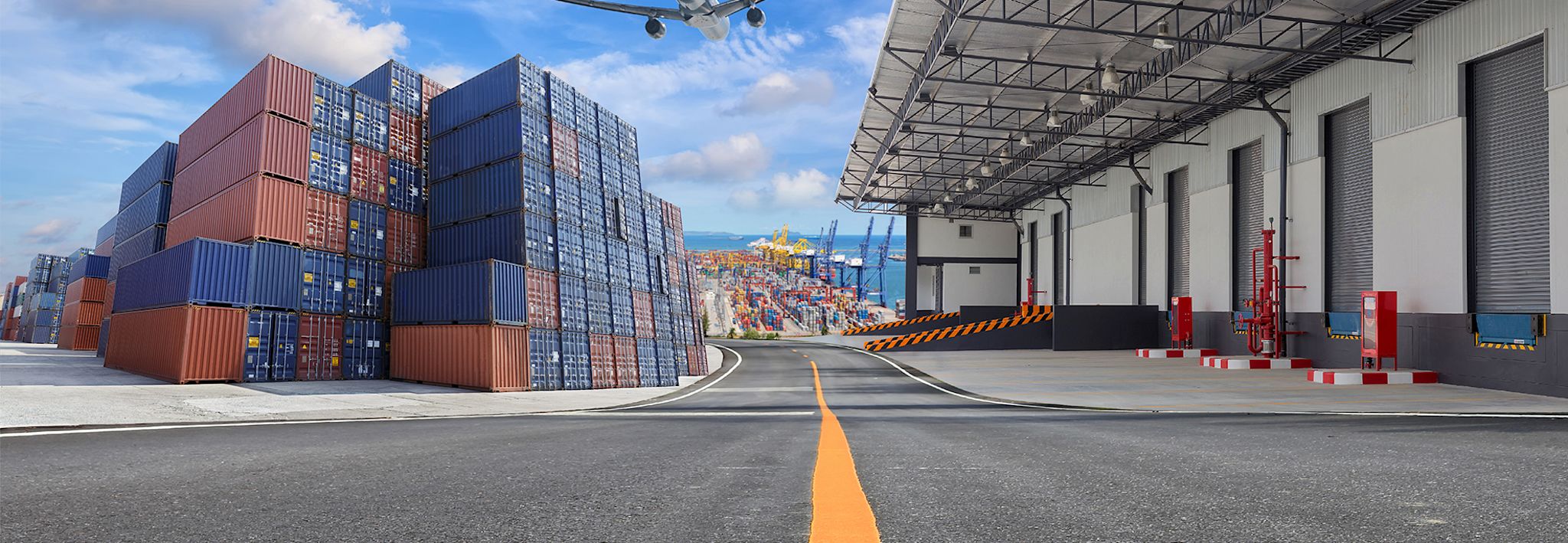 A supply chain facility has a warehouse, shipping containers, and a distribution center.