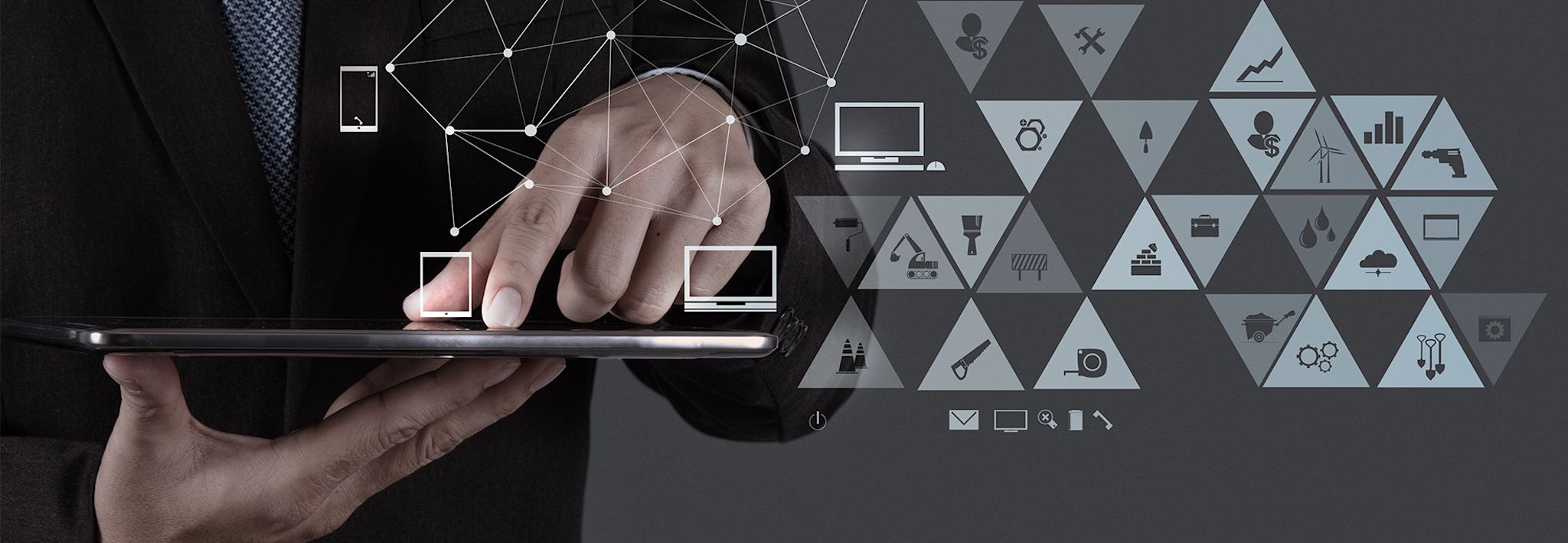 Man on his tablet A man is holding a tablet with logistics and supply chain icons.