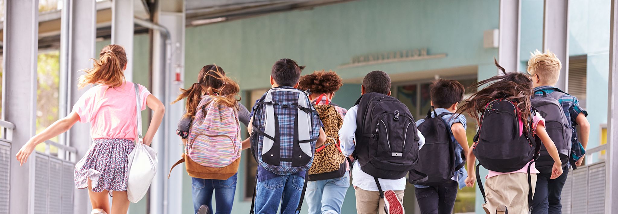 A group of special education children are going to class at school.