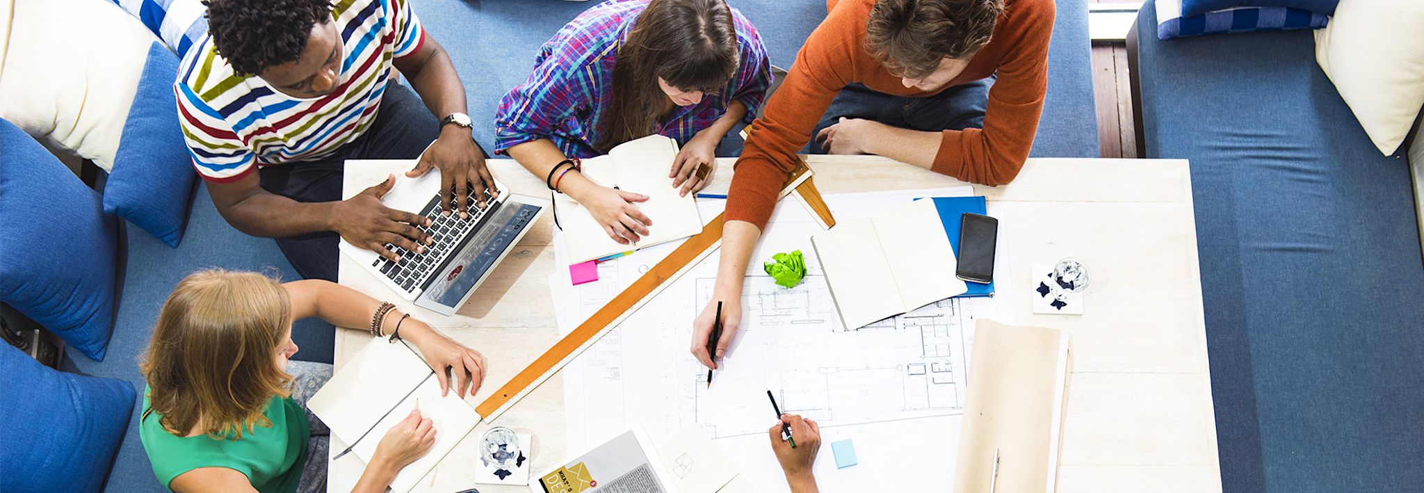 A group of project management professionals is having a business meeting.